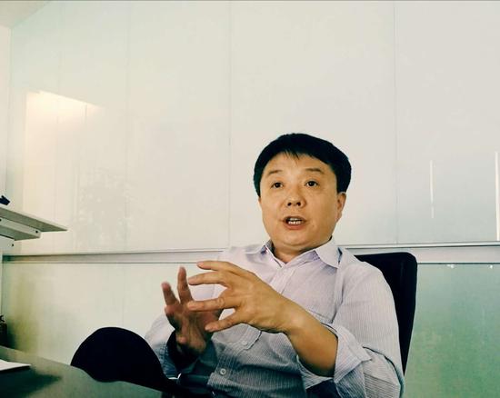 负责小米知识产权和专利战略的高级副总裁王翔接受新浪科技采访